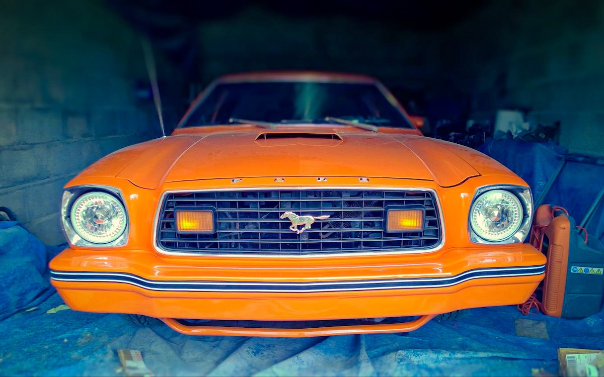 1978 Ford Mustang II Hardtop freshly restored in Tangerine Orange, original Ford color, front three-quarter view