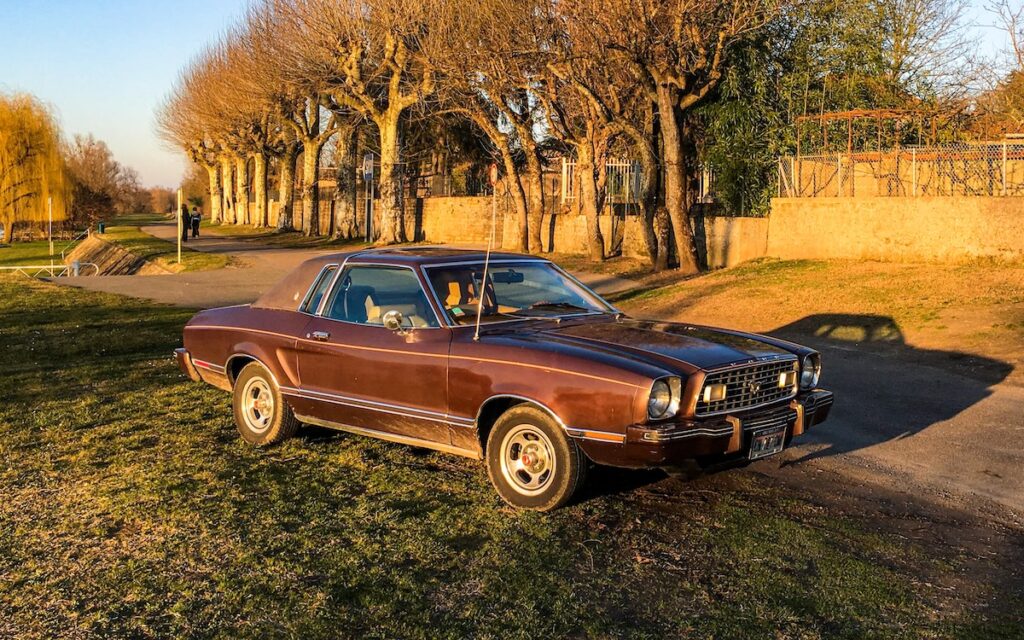 1977 Mustang II survivor parked by the Saone River after a road trip