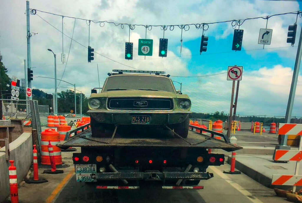 1968 Mustang Survivor on a flatbed truck after coming out of storage