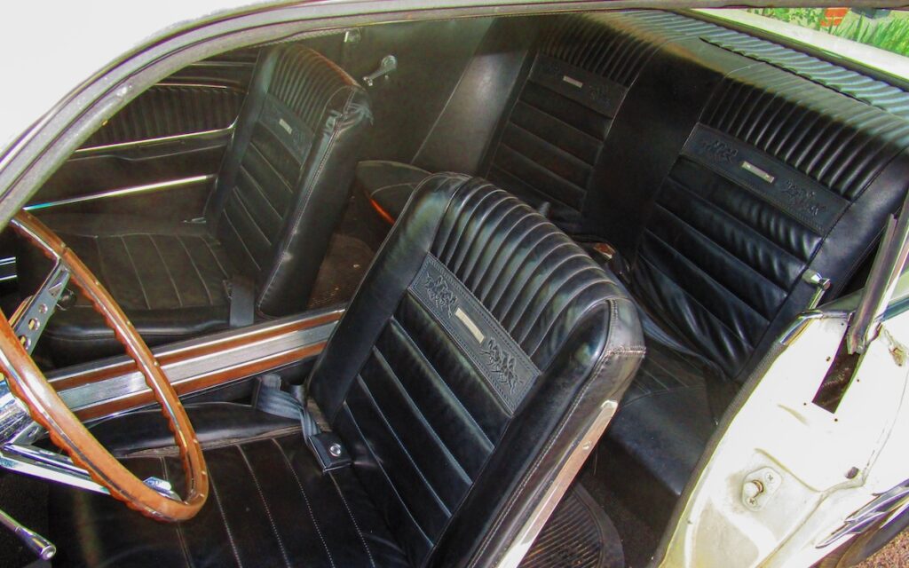 Worn interior of Chloe’s 1966 Mustang before restoration.
