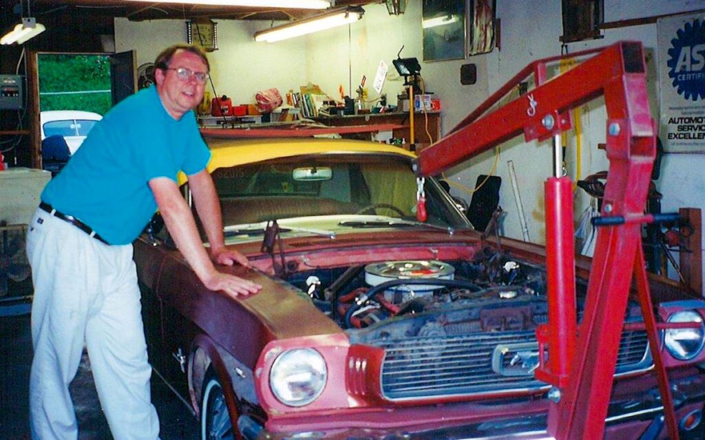First restoration of a 1966 Mustang Emberglo in 2000, engine being removed
