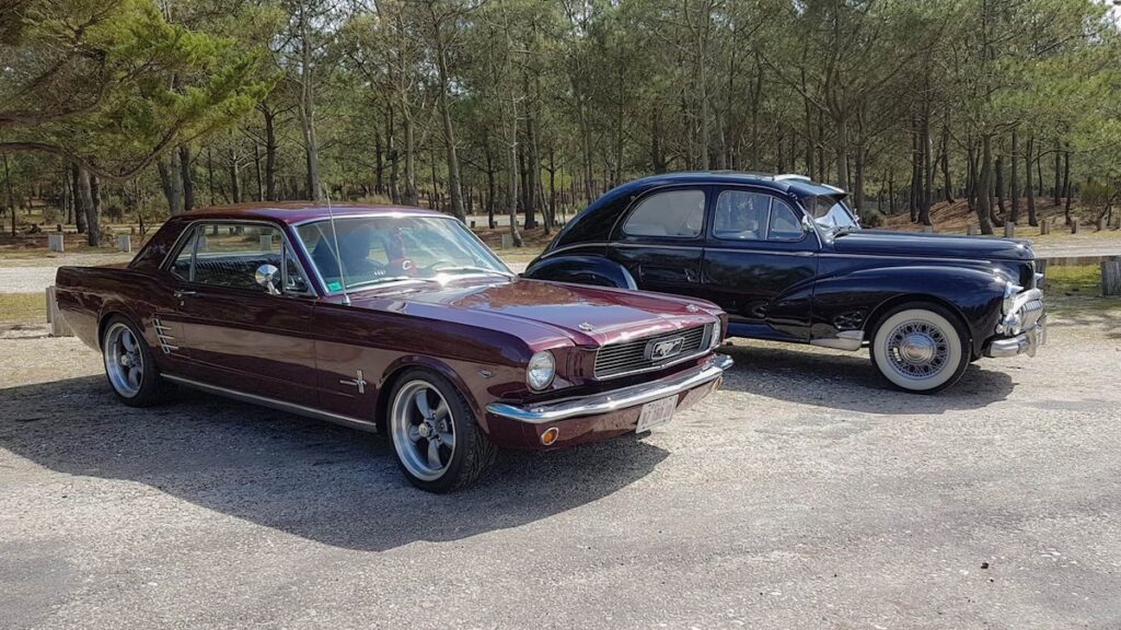 1966 Mustang Vintage Burgundy coupe and Peugeot 203 coupe, classic cars owned and driven by Sophie