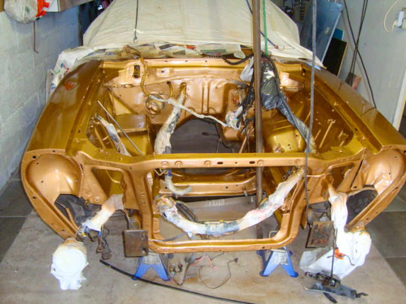Freshly painted engine bay during the restoration of a 1978 Mustang II