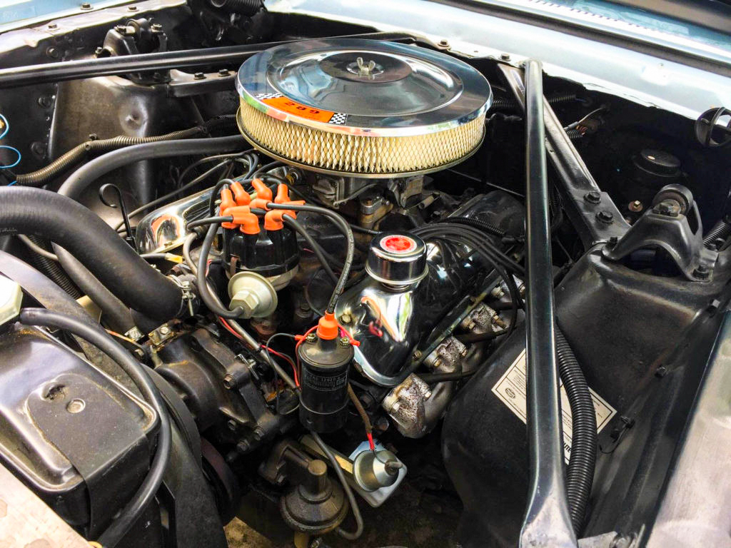 Under the hood, the original spirit remains — the beating heart of a 1965 Mustang Convertible win.
