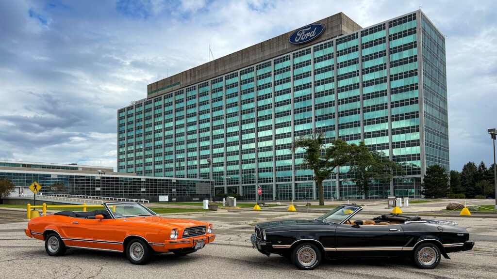 Two Mustang II Classic II convertibles parked together, owned by Robert and his friend Mark.