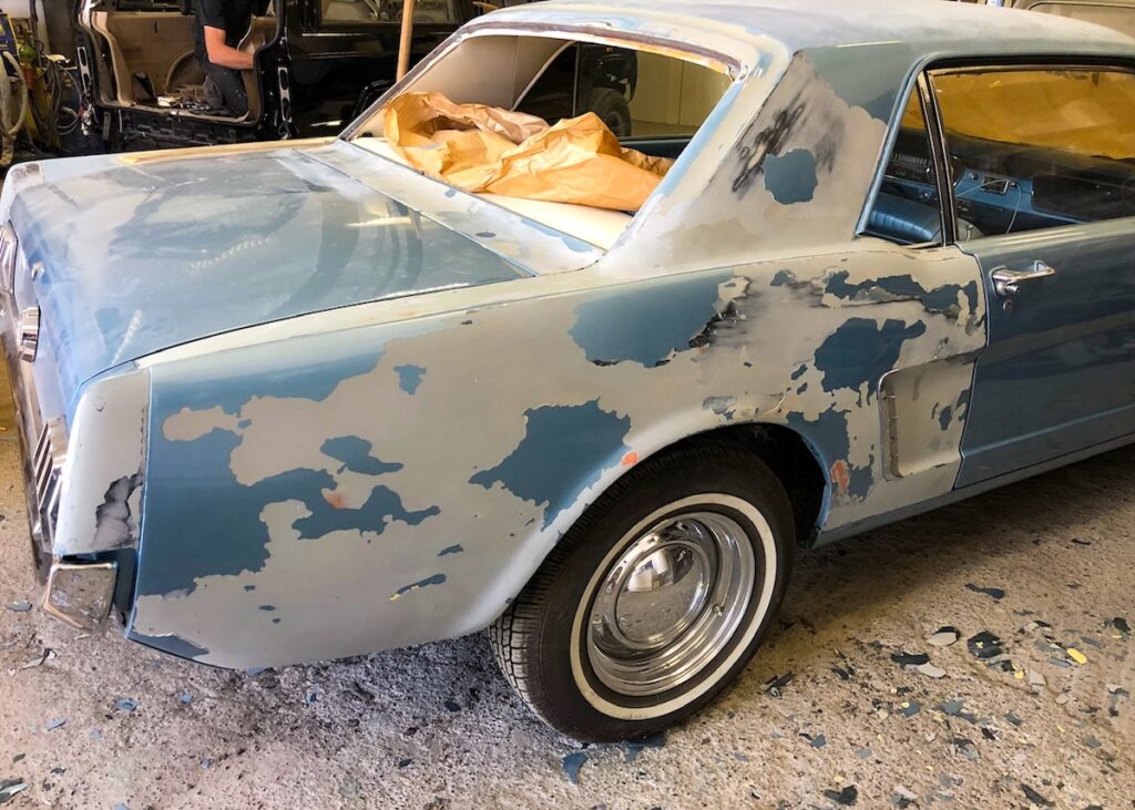 1965 Mustang Coupe body stripped to bare metal before restoration and repaint