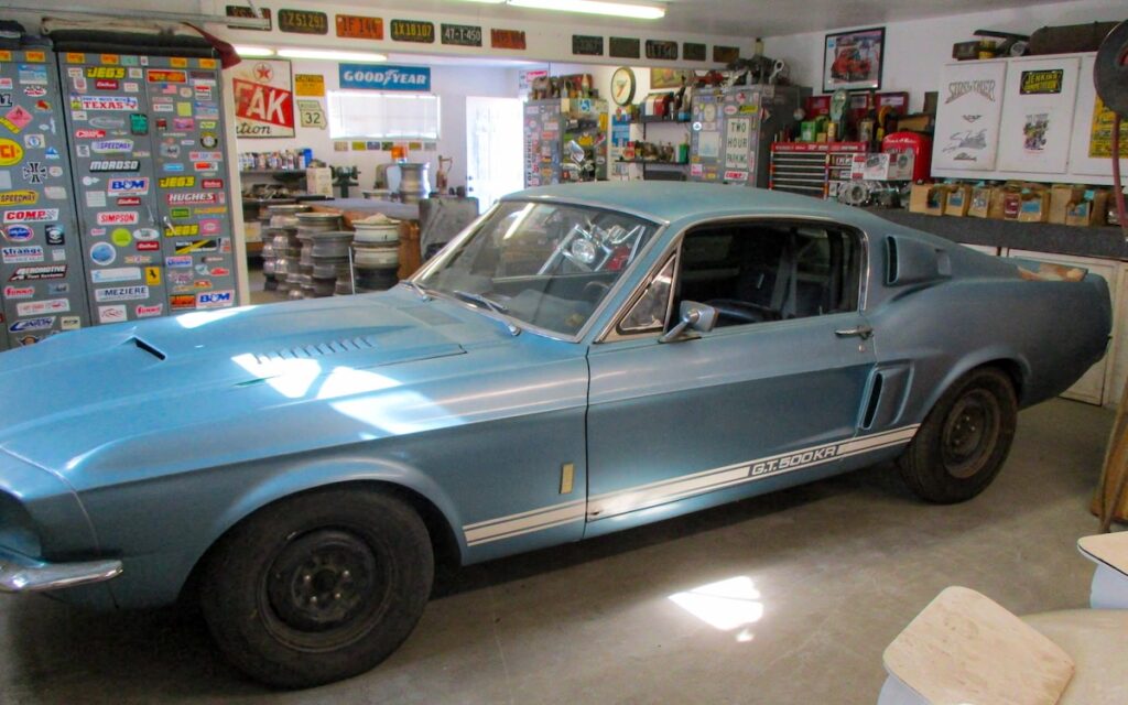 Side profile of David’s 1967 Shelby GT500 parked in his garage