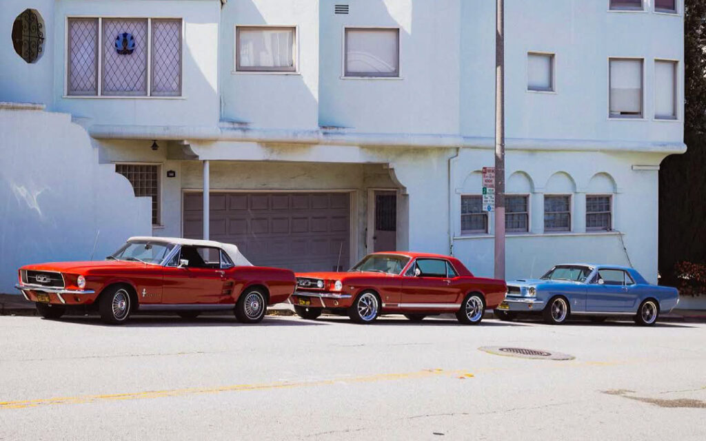 Francesca’s 1966 Ford Mustang parked with other Mustangs during a group outing