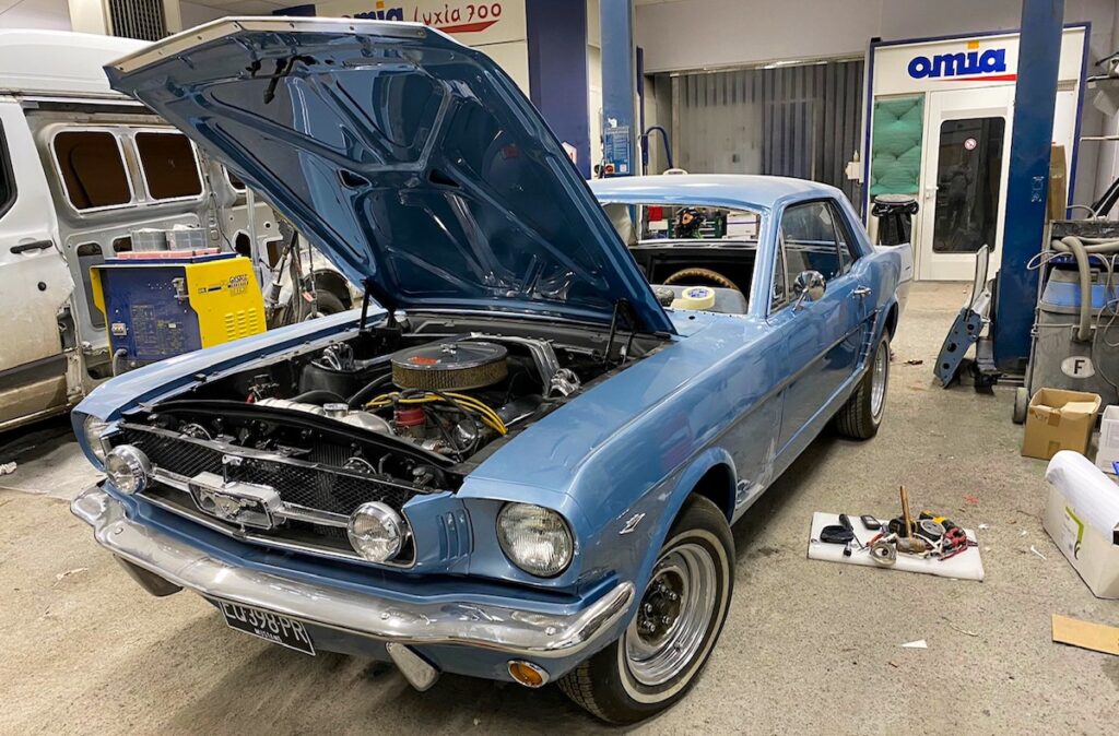 Front view of 1965 Mustang Coupe with new grille and fog lights installed