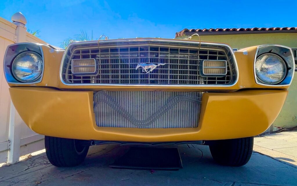 Modified front end of a Mustang II with exposed radiator
