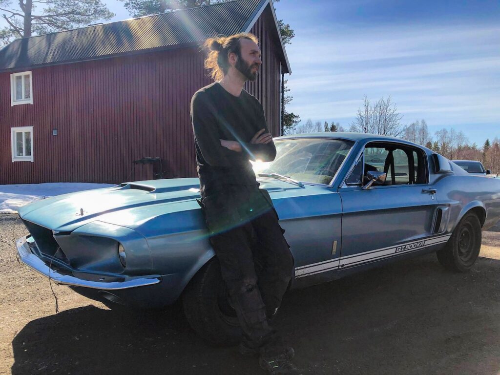 David standing with his 1967 Shelby GT500, enjoying the car during the Swedish driving season