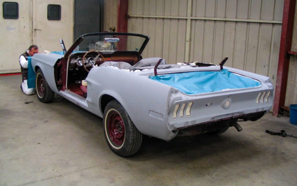 1968 Mustang convertible body restoration in progress before Royal Maroon repaint