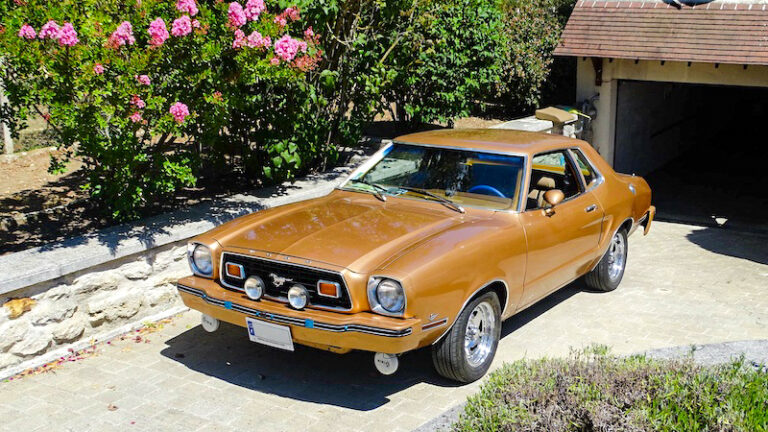 Fully restored 1978 Ford Mustang II parked in front of its owner’s home in France