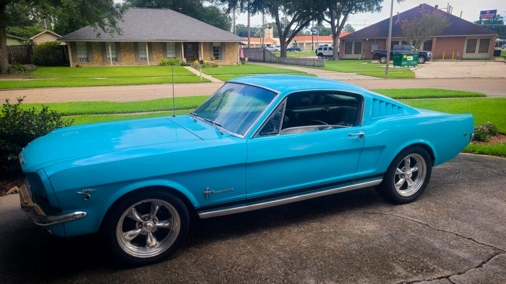 More than fifty-seven years after purchasing it, John's Mustang is still parked in front of his home. Photo credit: Johnny Kovalick