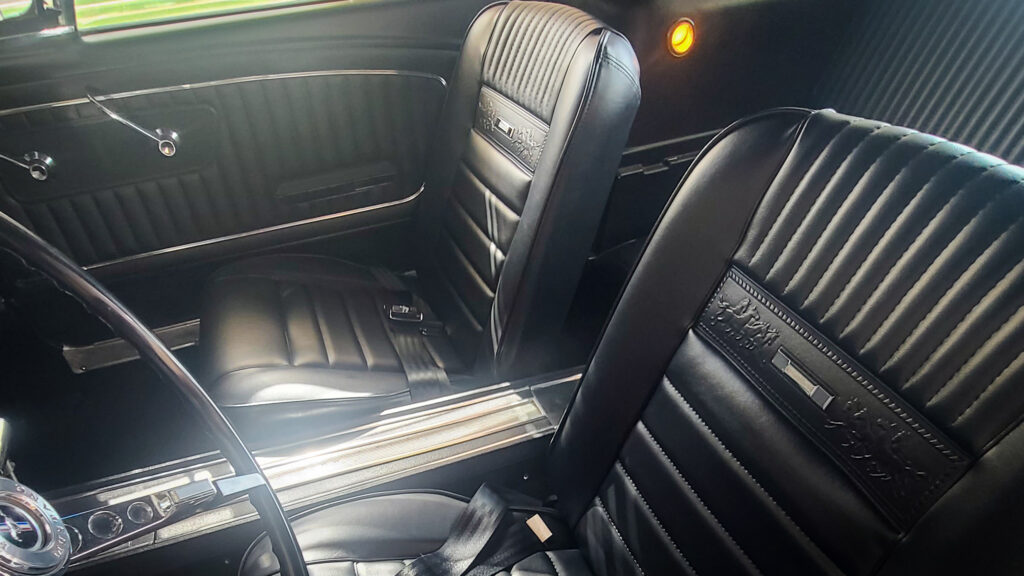 The restored interior now features black Pony upholstery, replacing the original Palomino interior. Photo credit: Johnny KovaliThe restored interior now features black Pony upholstery, replacing the original Palomino interior. Photo credit: Johnny Kovalickk