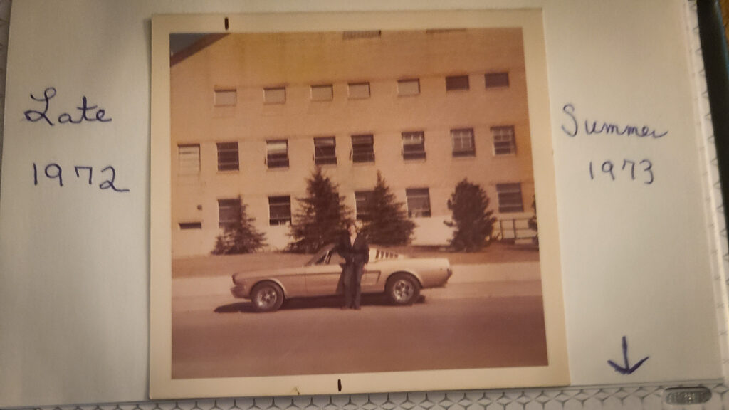 John poses with his 1965 Ford Mustang Fastback in late 1972. On this picture, the car is still wearing its original Prairie Bronze paint. Photo credit: Johnny Kovalick
