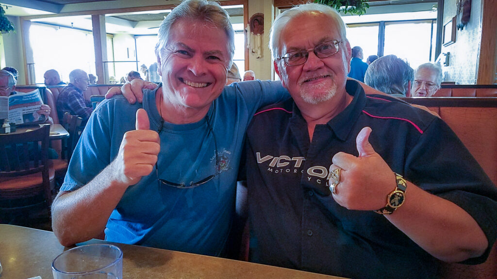 John and Gerald Green celebrate another milestone in the Mustang's restoration—a mechanical adventure, but above all, a lasting friendship. Photo credit: Johnny Kovalick
