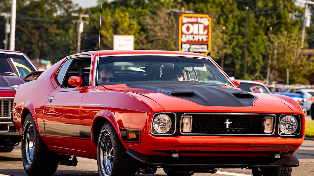 Heather's 1973 Mustang Mach 1 cruising on Woodward Avenue in August 2025